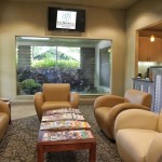 Inside of office seating area with TV view